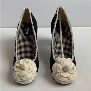 CHANEL Black and Cream Women's Pumps with Iconic Flower Accent